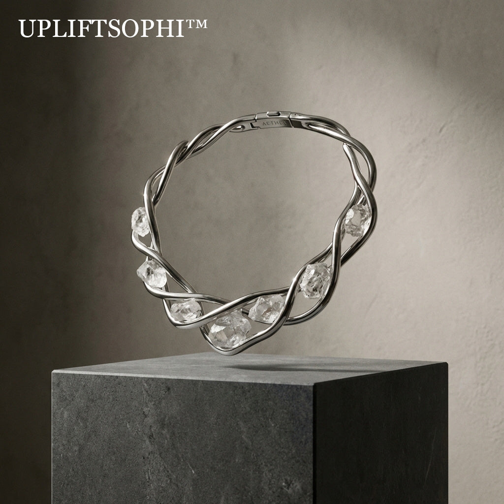 💎Upliftsophi™ THE AETHEL QUARTZ TORQUE "Fashion is the bridge between the earth and the architect. A structural collar engineered to entwine the wearer in a liquid flow of silver and raw, unpolished crystal."
