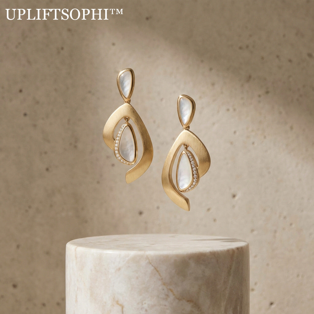 🐚 Upliftsophi™ THE ETHEREAL SHELL PENDULUMS - "True luxury resides in the balance of the organic and the engineered. We have captured the timeless shimmer of Mother-of-Pearl within a fluid, satin-gold embrace."