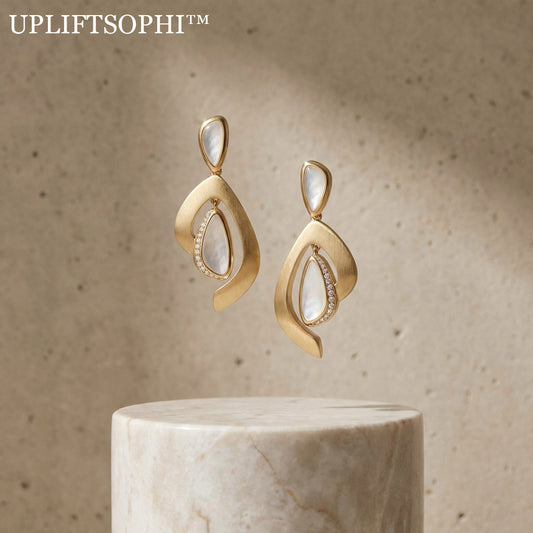 🐚 Upliftsophi™ THE ETHEREAL SHELL PENDULUMS - "True luxury resides in the balance of the organic and the engineered. We have captured the timeless shimmer of Mother-of-Pearl within a fluid, satin-gold embrace."
